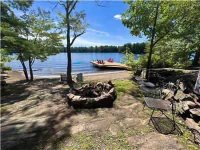 Charming Muskoka Cottage, Spectacular Waterfront with Beautiful Beach and Dock
