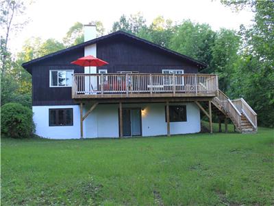 The 3 Pines Chalet - view on the ski slopes and deeded access to Calabogie Lake