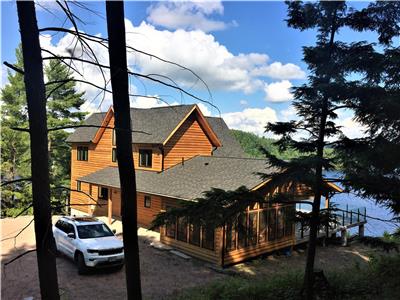 Exquisite Ecolog home on 5.2 acres with panoramic view of Redstone Lake