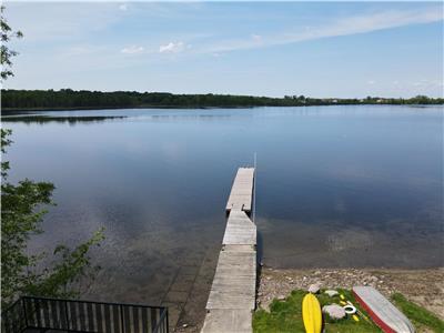 Large waterfront property with boathouse sitting area! Views! Nature! Sunsets!
