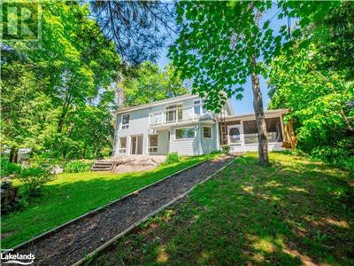 Lake front cottage with 2.4 acres on beautiful Turtle Lake.