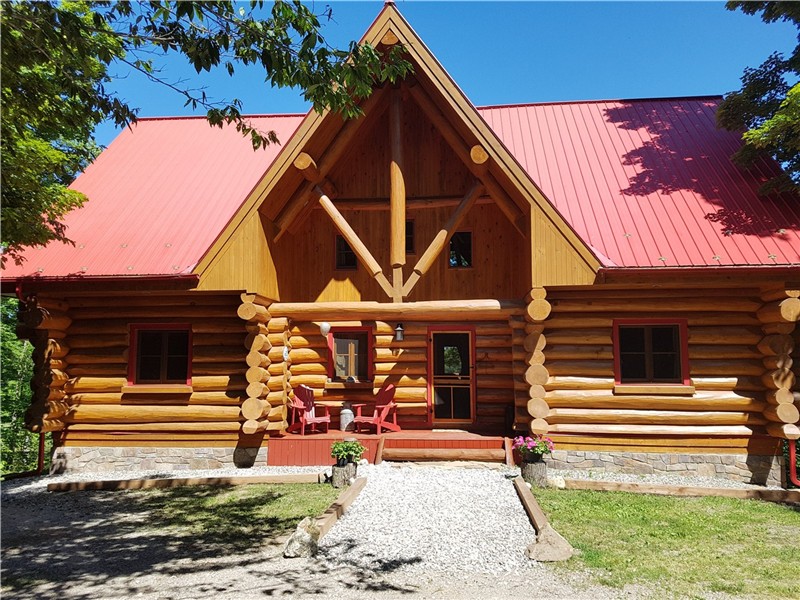 Chalet Stafford Bay, magnifique maison en rondins au bord du Rideau