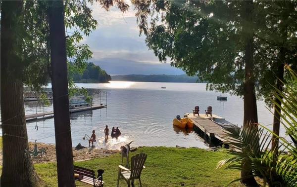 Beautiful family cottage with sandy beach front water