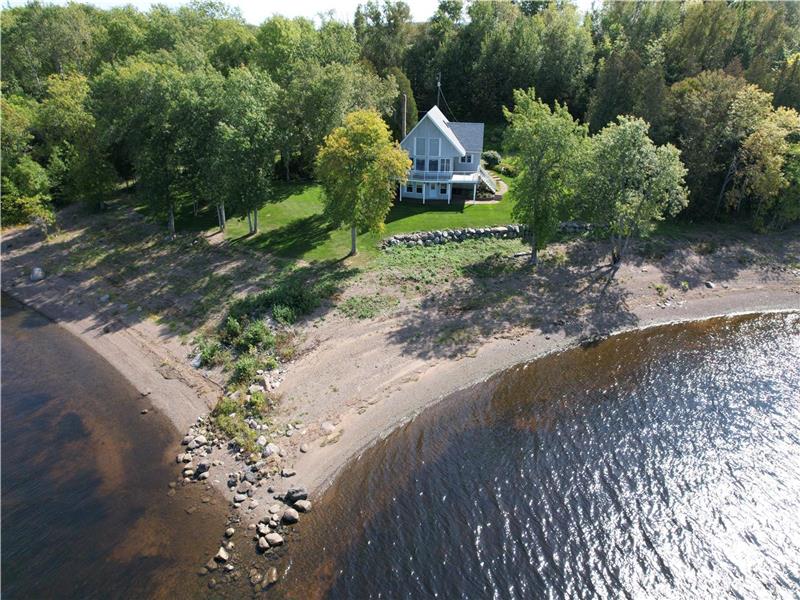Beautiful waterfront cottage on Saint John River, private beach and dock.