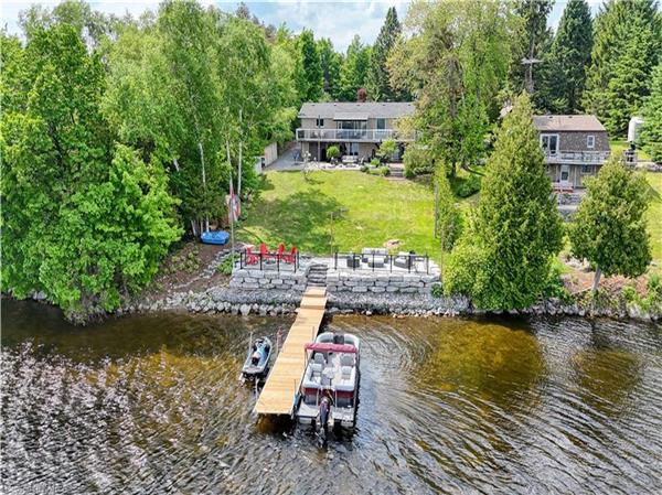 Beaver Lake Retreat : Superbe chalet 4 saisons au bord du lac avec spa, kayaks, foyer et plus !