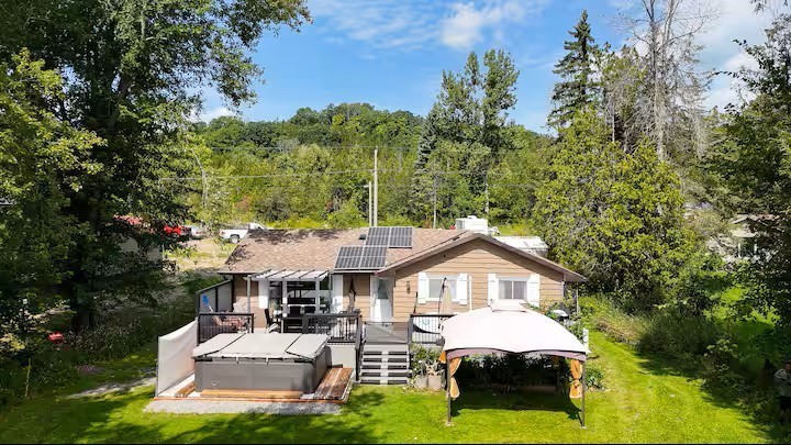 Modern Waterfront Turnkey – 100' Frontage & Trail Access