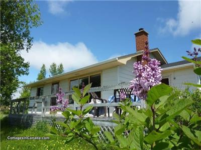 Joli chalet au bord de la rivire de Cocagne