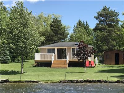 A Quiet Cottage Retreat - Close to City - Beautiful west exposure 100' waterfront