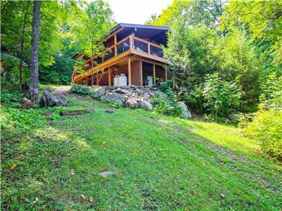 Chalet familial confortable avec bain  remous