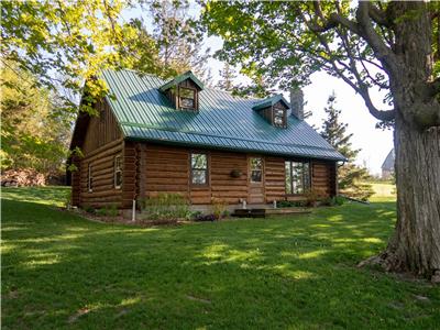 Prince Edward Bay Cottage - a private log home experience on 7 acres with 250 ft of water front