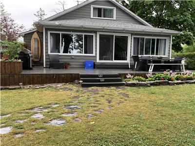 Lakefront Cottage right on beautiful sandy beach.