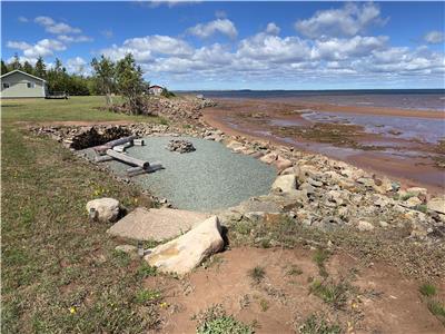 Private Oceanfront Cottage with 200 feet beach front on 1.5 acres
