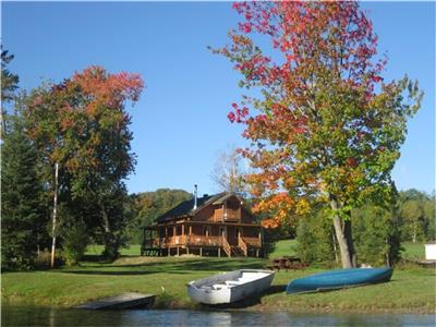 Chalets au bord de lac de l'agrile Val des Bois