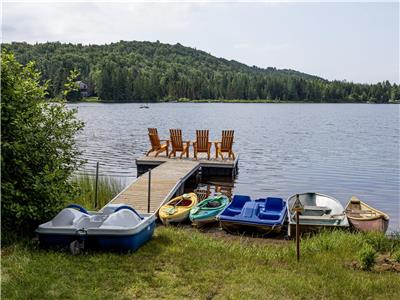 Ste-Lucie chalet - dock, boats, air conditioning, veranda mosquito, private beach, taxes included