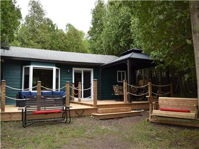 Private lakefront cottage with hot tub