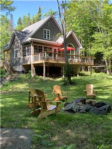 Tranquil Tamarack Lake , fully equipped cottage with all the amenities. Enjoy a natural retreat.