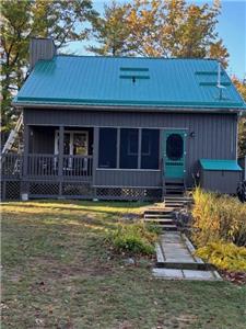 Waterfront Cottage with 10 Acres on Beautiful Lake