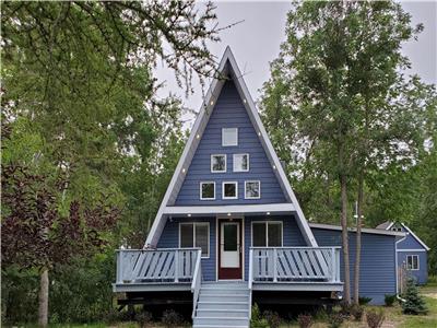 Iconic A-Frame in Spruce Sands: Only steps away from a beautiful sandy beach