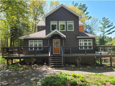 Welcome To Spirit Rock A 5BR Executive S/W Facing Lake Front Cottage On Prestigious Redstone Lake