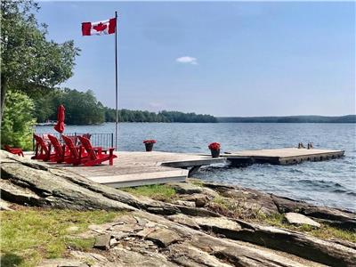 Kennisis Lake Escapes- Lake House *Summer 2025*  Exquisite retreat with amazing granite & sand shore