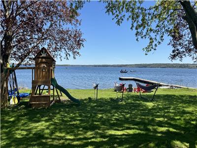 Majestic Lake Haven ~ Heated Pool ~ Hot Tub ~ Dock ~ Yard Games ~ Coffee Bar ~