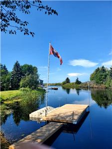 LAKEFRONT W/BOAT DOCK & ONE JET SKI DOCK IN BEAUTIFULLY GATED COMMUNITY IN VICTORIA BAY ESTATES