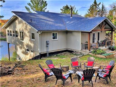 Beautiful Lakehouse Open Concept with 400 feet shoreline on 5 acres of private forest