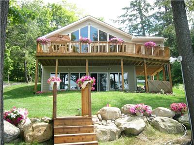 Come relax at our Muskoka Lakefront home this summer on the water