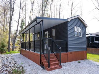 Secluded Resort Cottage Amidst the Tree | Own Today at Shamrock Bay Resort in Muskoka