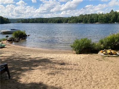 Breathtaking highlands, 100' of a beautiful sand beach, shallow entry and great swimming