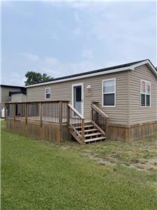 This resort cottage has ample space to enjoy, inside and out!