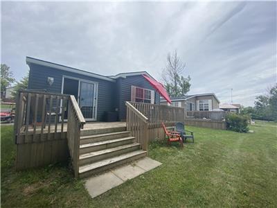 An affordable way to enjoy spacious cottage living here in Prince Edward County!