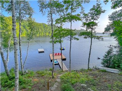 Lakeside Bliss: Private Retreat on 3.7 Acres with Dock, Hot Tub, and Scenic Views