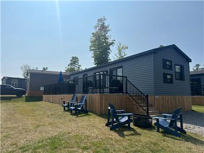 The unit comes complete with decking and rails making it move-in ready!
