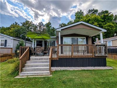 Located directly across from the multicourt, you can watch your kids play right from your deck!