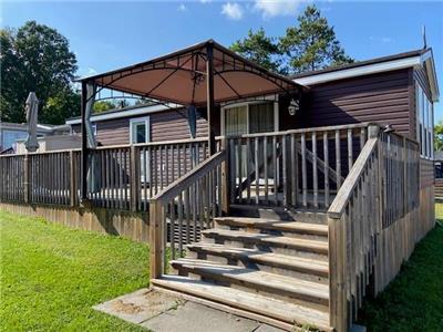 This unit is professionally decorated and comes with appliances and furnishings!