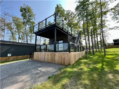 This resort cottage has an amazing large rooftop patio, providing breathtaking views!