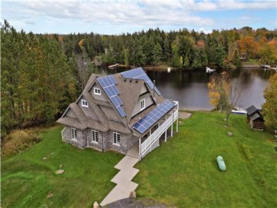 Beachfront All Season Muskoka Cottage with Tesla Charger