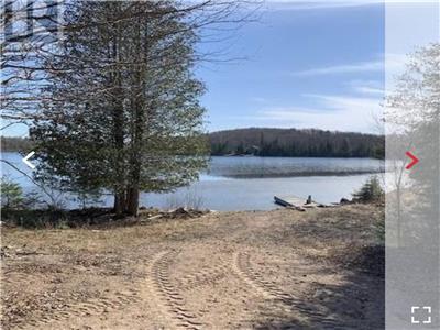 Waterfront Paradise ! 49 acres with sandy beach, zoned Commercial Tourist