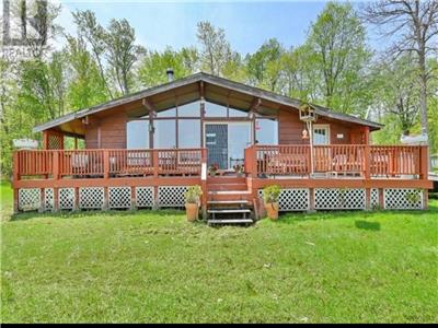 Moira Lake Retreat, cozy 3 bedroom rustic cottage with modern amenities. Best fishing lake around.