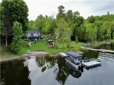 Spacious Lakefront Outdoor Kitchen, Sandy Beach & Private Dock