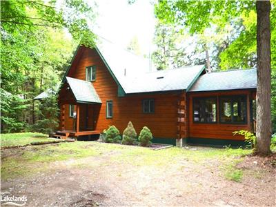Welcome to Kawagama Shoreline a beautiful log home with ATV trails nearby, water sports and hiking