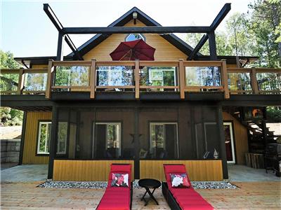 Waterfront all-season custom-built cottage for sale.