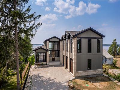 New luxury cottage in Kawartha that blends new finishes with cottage feel.