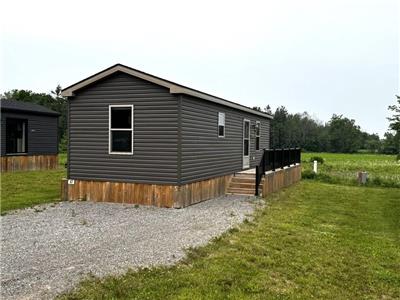This resort cottage sits on a prime site, perfect for a large family, with 2025 site fees included!