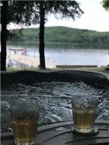 Book your spring vacation soon! Enjoy the hot tub by the lake! Filling up fast