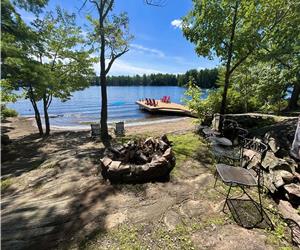 Charming Muskoka Cottage, Spectacular Waterfront with Beautiful Beach and Dock