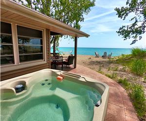 Lake Front Lucky Seven Cottage w/ Hot Tub