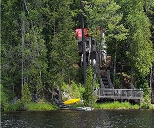 Lake front cottage include a fishing boat