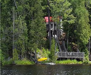 Beautiful Lake front cottage with a fishing boat